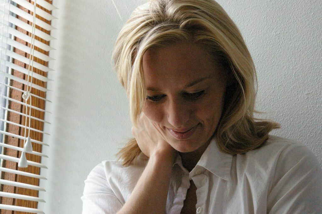 Happy, contemplative woman