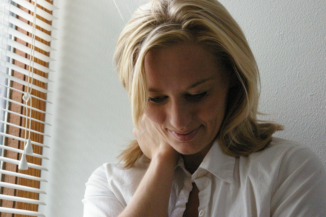 Happy, contemplative woman
